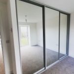 door floor to ceiling glass wardrobe