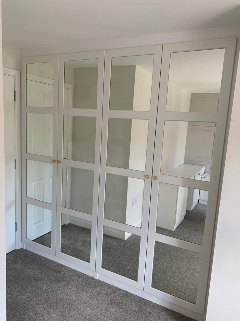 4 door white and mirrored wardrobe