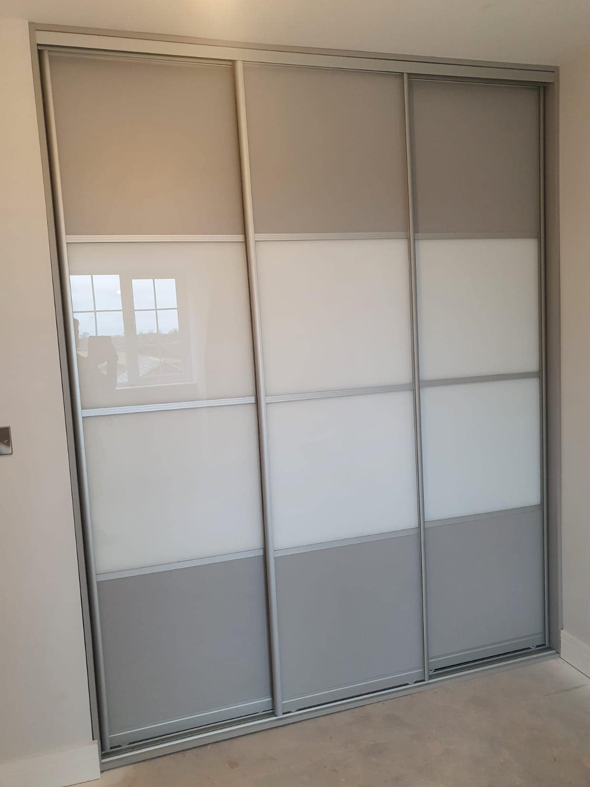 grey built in wardrobe