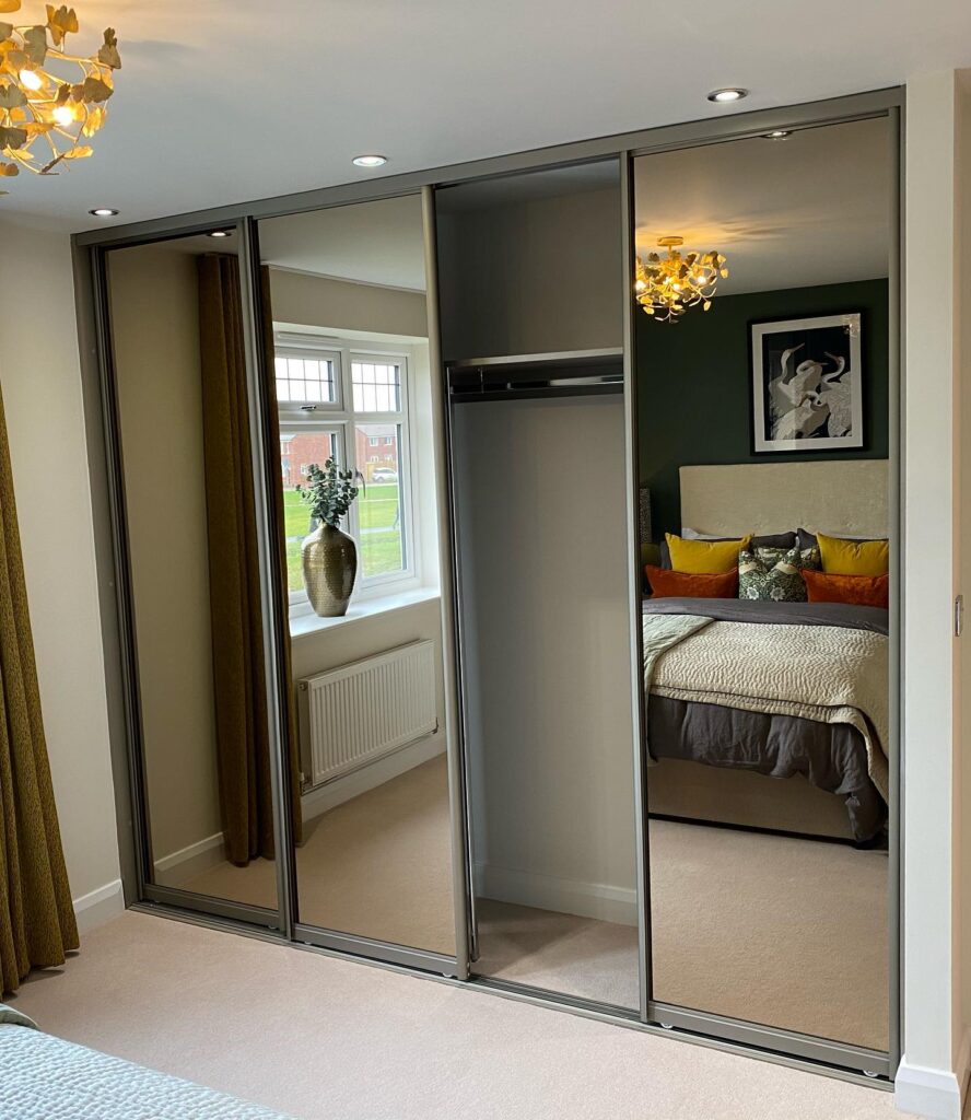 Mirrored bedroom wardrobes fitted by Glide and Slide