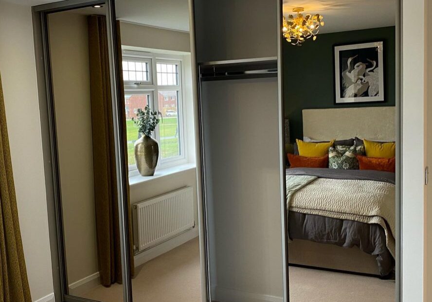 fitted Glide & Slide sliding wardrobes in small house